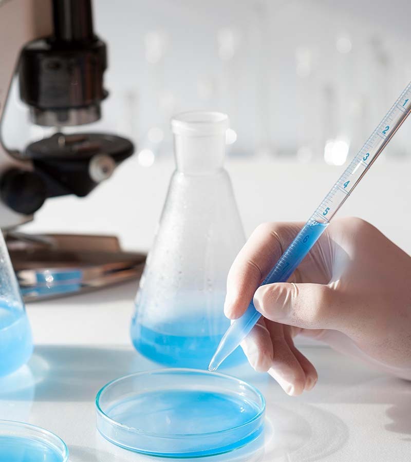 32close-up-hand-with-glove-wearing-pipette